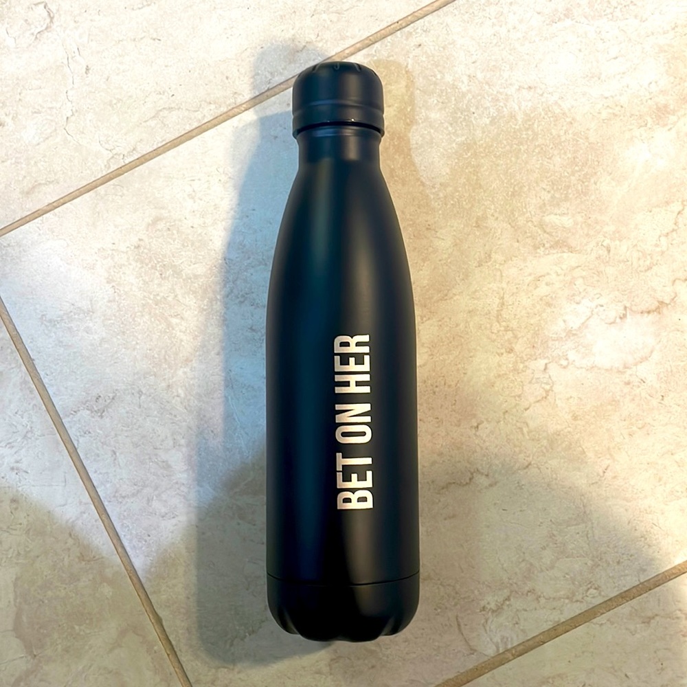 Insulated water bottle. With the saying “Bet On Her”